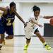 Huron senior Auzhane King drives pass a Ypsilanti defender in the game on Monday, Feb. 25. Daniel Brenner I AnnArbor.com
